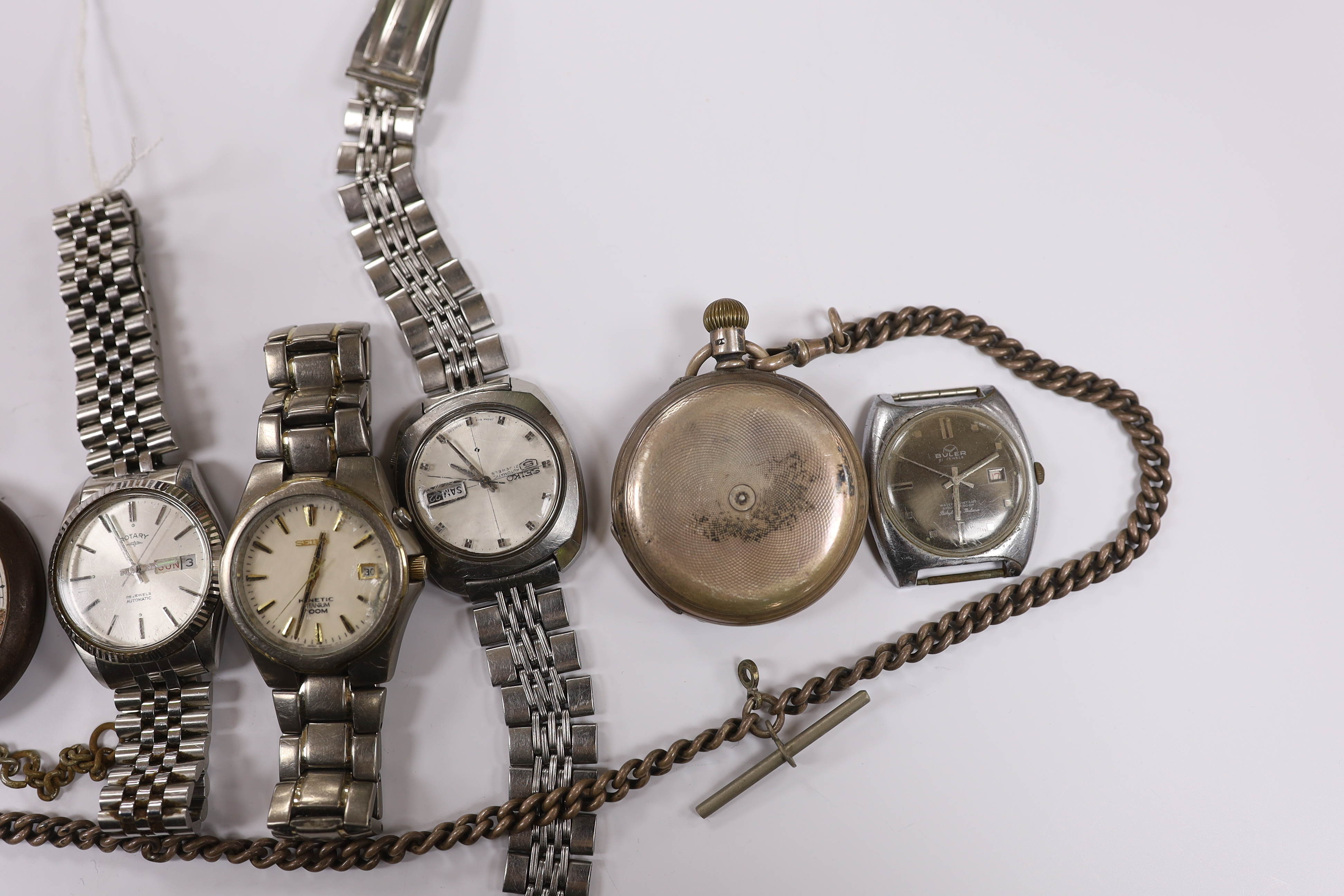 Two gentleman's modern stainless steel Seiko wrist watches, three others including a Rotary and two pocket watches including silver with silver albert.